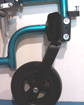 Caster housing in a trailing, or rearward, position