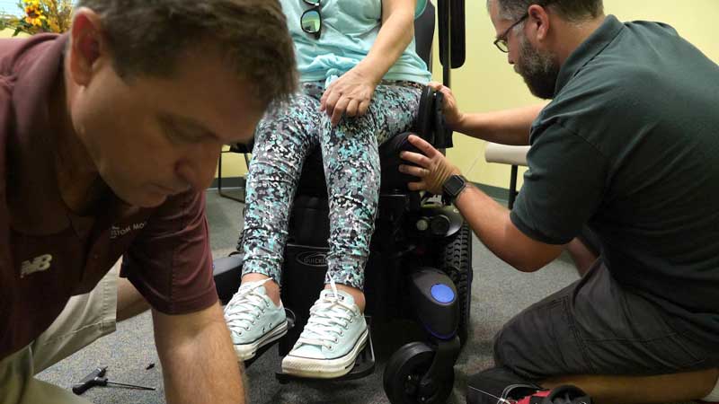 Performing adjustments on a power wheelchair